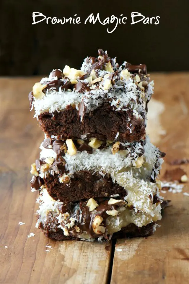 Three brownies with coconut toppings are stacked. The text above it reads: Brownie Magic Bars.
