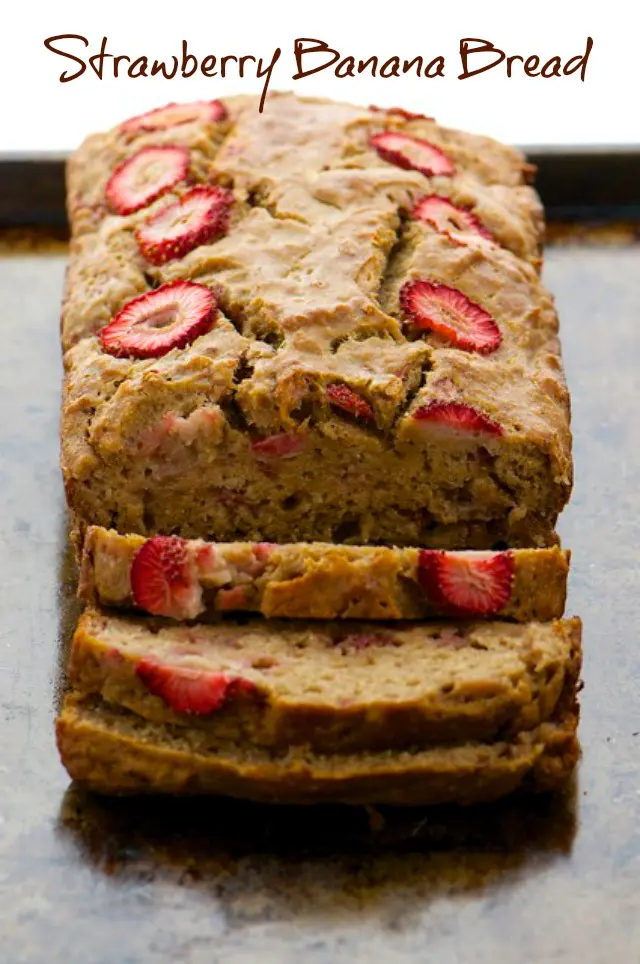 A loaf of quick bread with sliced strawberries on top. Text reads, "Strawberry Banana Bread."