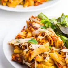 This Easy Vegan Garlic Pasta is a creamy, garlic pasta, covered in red sauce and dripping with delicious vegan cheese. It's easy to make and healthy too! We love to serve this on a Friday night and enjoy leftovers for the week. It's fancy enough to share as a family dinner, but simple enough so you can enjoy your guests too!