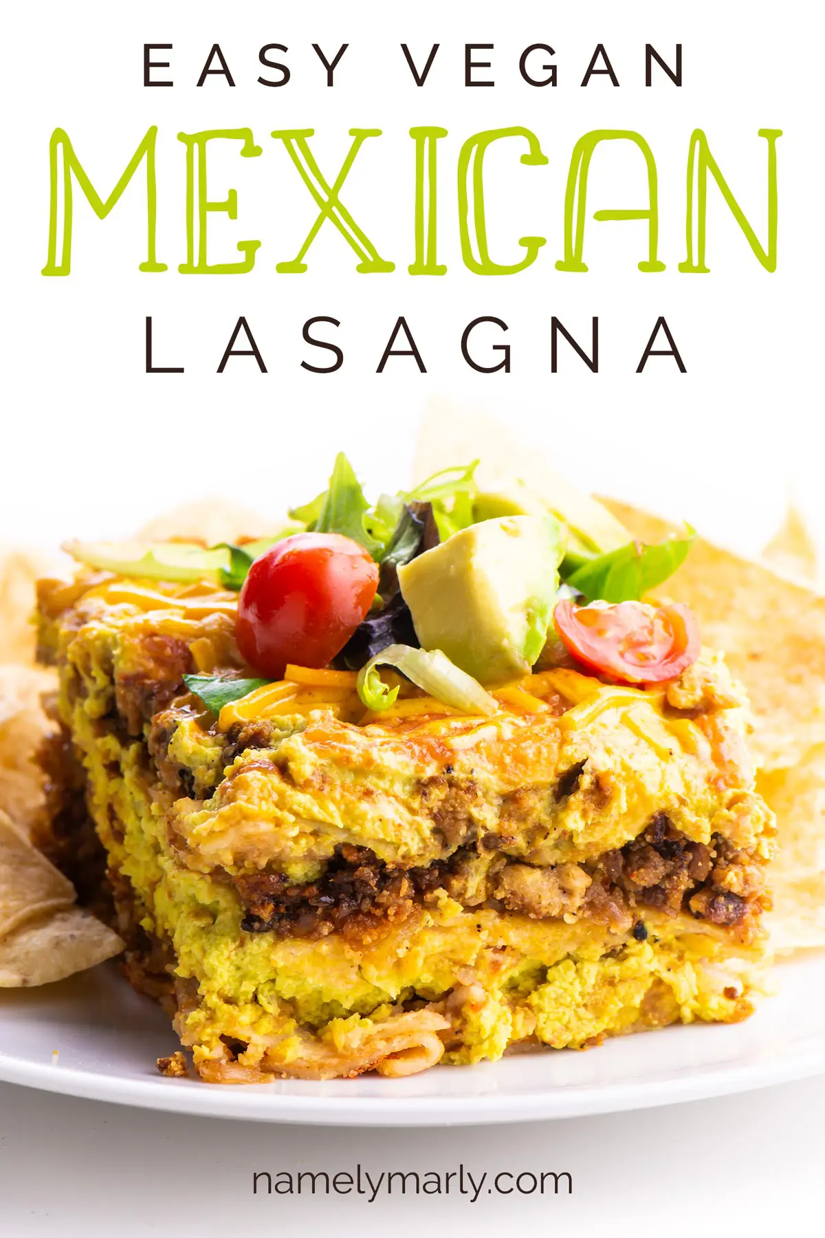 A Mexican entree sits on a plate next to tortilla chips. Text above it reads: Easy Vegan Mexican Lasagna.