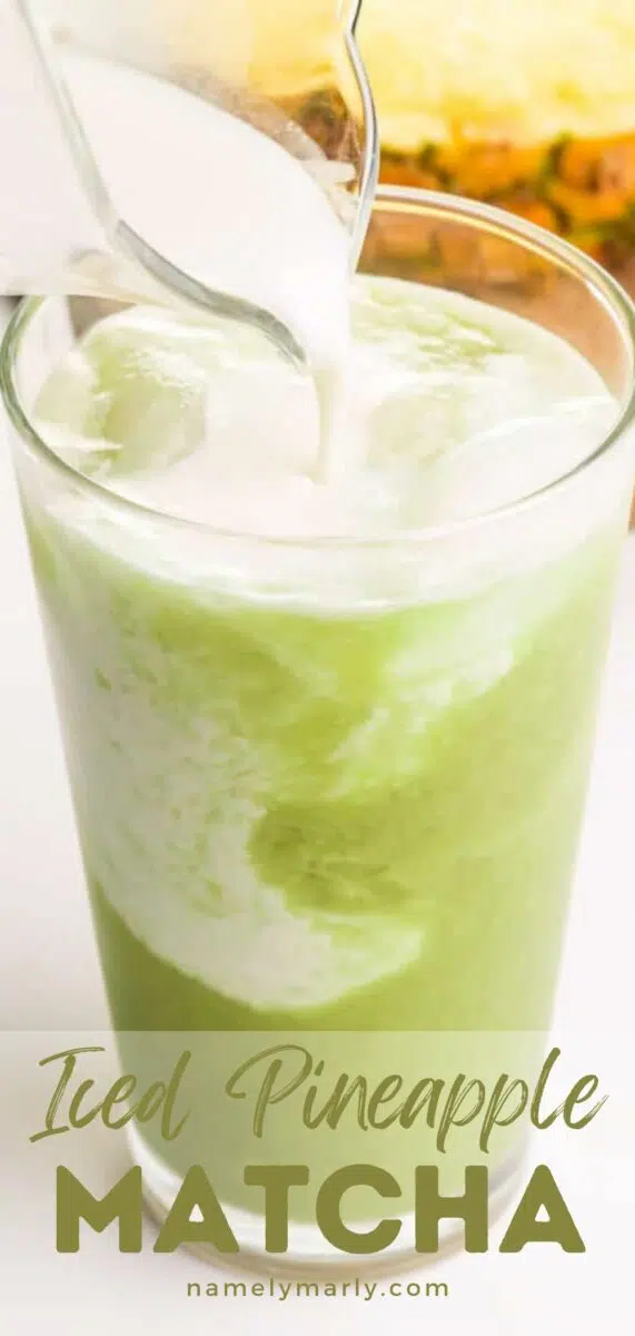 Coconut milk is being poured into a glass with a green liquid. There is a pineapple in the background. The text reads, Iced Pineapple Matcha.