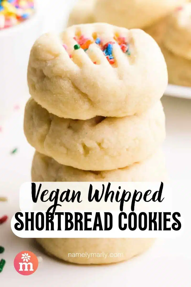 A stack of cookies has sprinkles beside it. The text reads Vegan Whipped Shortbread Cookies.